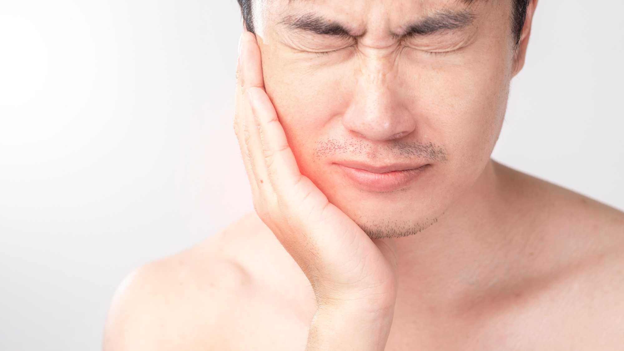 Man experiencing dental pain.jpg